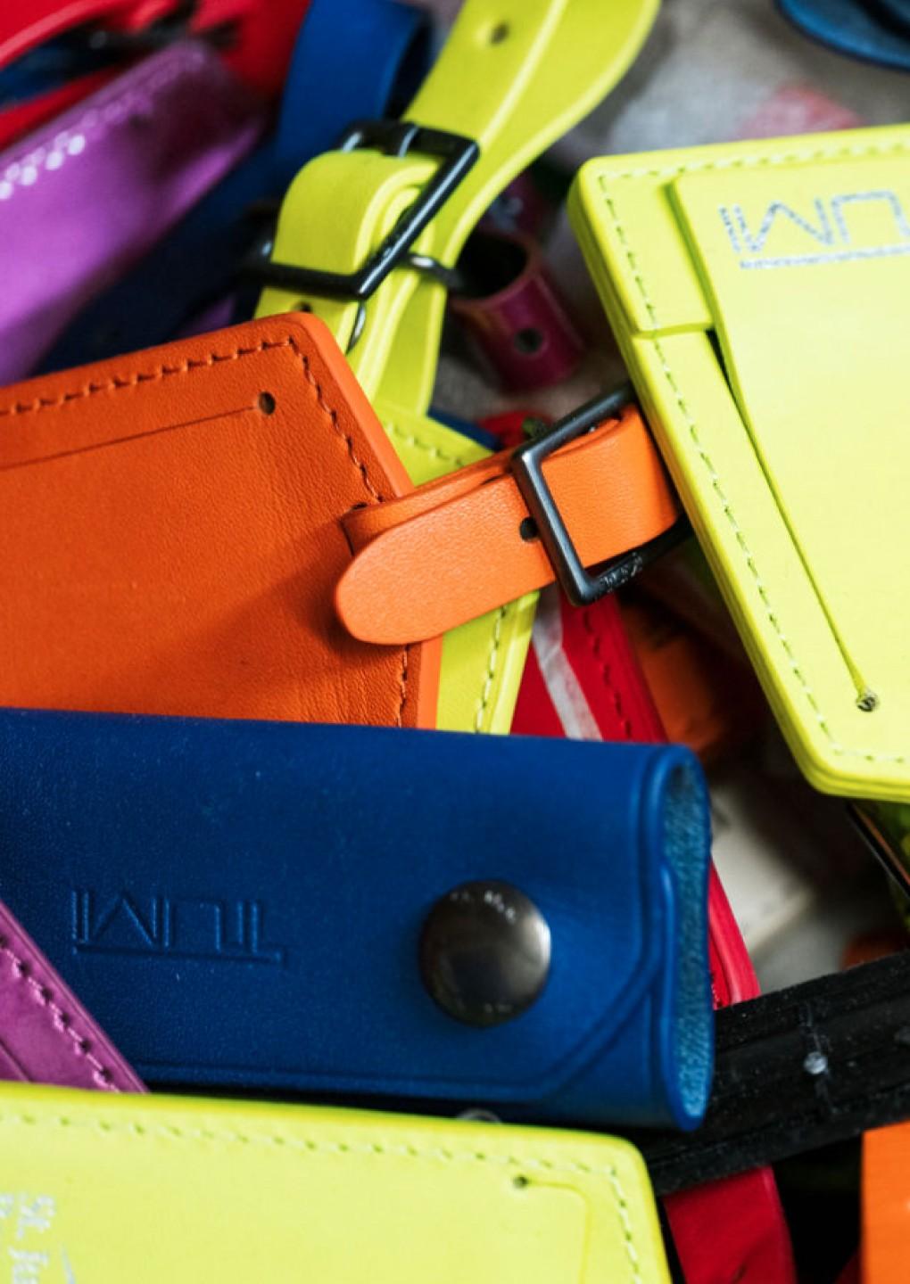 A variety of colorful luggage tags