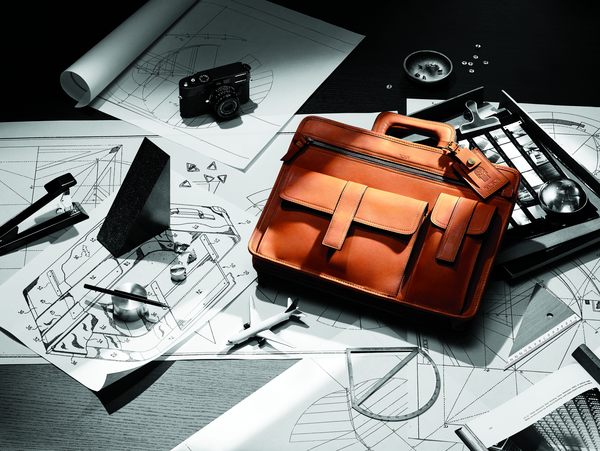 Tumi brand history on sale